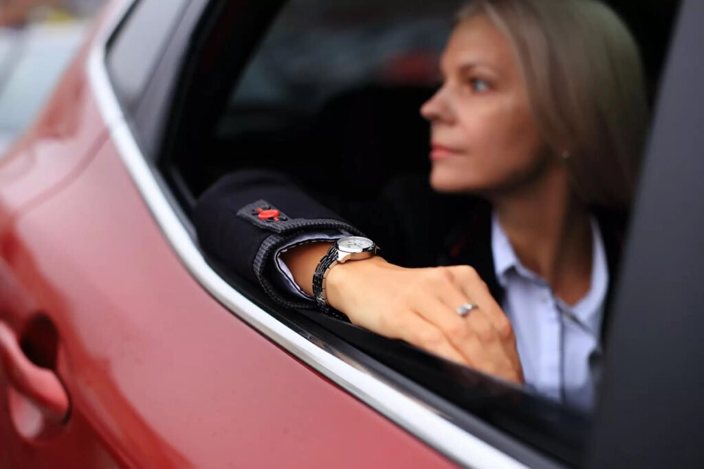 A year-old girl wearing a real luxury watch in a red car - Ctime watch